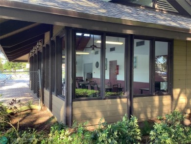 Escape to this stunning 2bedroom, 2bathroom apartment, boasting on Pine Island Ridge Country Club in Florida - for sale on GolfHomes.com, golf home, golf lot