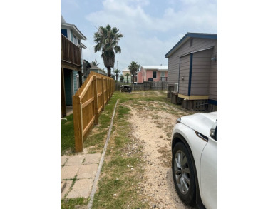 This adorable cozy coastal cottage sits on a large lot just 2 on Rockport Country Club in Texas - for sale on GolfHomes.com, golf home, golf lot