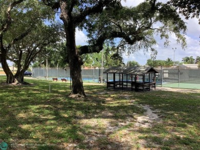 Escape to this stunning 2bedroom, 2bathroom apartment, boasting on Pine Island Ridge Country Club in Florida - for sale on GolfHomes.com, golf home, golf lot