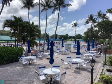 Escape to this stunning 2bedroom, 2bathroom apartment, boasting on Pine Island Ridge Country Club in Florida - for sale on GolfHomes.com, golf home, golf lot