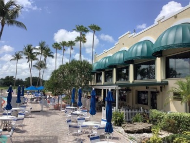 Escape to this stunning 2bedroom, 2bathroom apartment, boasting on Pine Island Ridge Country Club in Florida - for sale on GolfHomes.com, golf home, golf lot