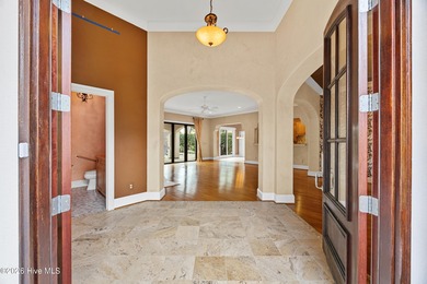 Located within the gates of Landfall, Wilmington's premier on Country Club of Landfall in North Carolina - for sale on GolfHomes.com, golf home, golf lot