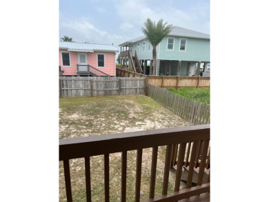 This adorable cozy coastal cottage sits on a large lot just 2 on Rockport Country Club in Texas - for sale on GolfHomes.com, golf home, golf lot