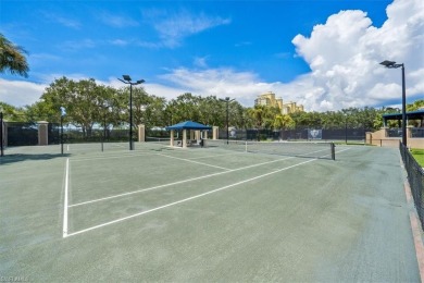 Welcome to this stunning first-floor carriage home, where on West Bay Beach and Golf Club in Florida - for sale on GolfHomes.com, golf home, golf lot