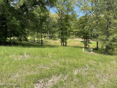 Beautiful wooded lot in established, upscale neighborhood on Annandale Golf Club in Mississippi - for sale on GolfHomes.com, golf home, golf lot