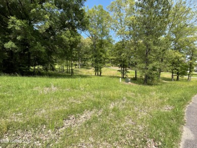 Beautiful wooded lot in established, upscale neighborhood on Annandale Golf Club in Mississippi - for sale on GolfHomes.com, golf home, golf lot