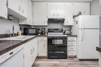 WOW! Beautifully maintained 2-bedroom 1.5 bath unit located on The Dunedin Country Club in Florida - for sale on GolfHomes.com, golf home, golf lot