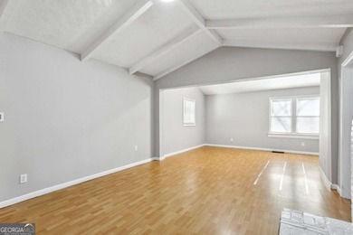 Welcome home to this bright and inviting 3-bedroom, 2-bath home on John A. White Golf Course in Georgia - for sale on GolfHomes.com, golf home, golf lot