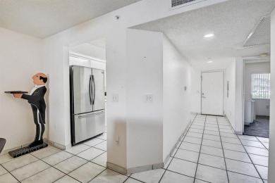 Enjoy lakefront living in the newest section of Century Village on Flamingo Lakes Country Club in Florida - for sale on GolfHomes.com, golf home, golf lot
