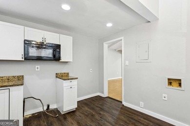 Welcome home to this bright and inviting 3-bedroom, 2-bath home on John A. White Golf Course in Georgia - for sale on GolfHomes.com, golf home, golf lot