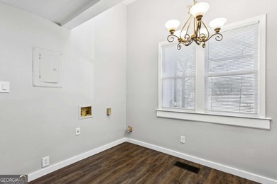 Welcome home to this bright and inviting 3-bedroom, 2-bath home on John A. White Golf Course in Georgia - for sale on GolfHomes.com, golf home, golf lot