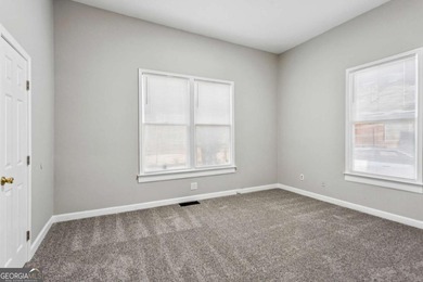 Welcome home to this bright and inviting 3-bedroom, 2-bath home on John A. White Golf Course in Georgia - for sale on GolfHomes.com, golf home, golf lot