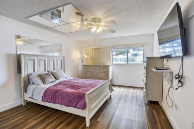 Enjoy lakefront living in the newest section of Century Village on Flamingo Lakes Country Club in Florida - for sale on GolfHomes.com, golf home, golf lot