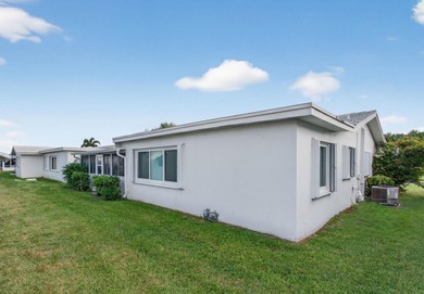 Welcome to your slice of paradise in this vibrant 55+ golf on Leisureville Community Golf Course in Florida - for sale on GolfHomes.com, golf home, golf lot