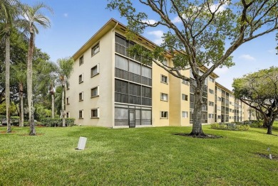 Enjoy lakefront living in the newest section of Century Village on Flamingo Lakes Country Club in Florida - for sale on GolfHomes.com, golf home, golf lot