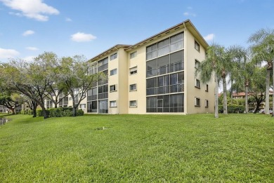 Enjoy lakefront living in the newest section of Century Village on Flamingo Lakes Country Club in Florida - for sale on GolfHomes.com, golf home, golf lot