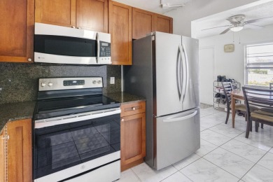 Discover this delightful ground-floor unit located in the on Flamingo Lakes Country Club in Florida - for sale on GolfHomes.com, golf home, golf lot