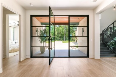 Indulge in the ultimate expression of lakefront luxury with this on Long Cove Golf Course in Texas - for sale on GolfHomes.com, golf home, golf lot