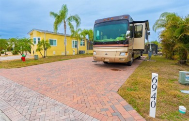 Prime Location RV Lot in Exclusive Clothing-Optional Community - on The Groves Golf and Country Club in Florida - for sale on GolfHomes.com, golf home, golf lot