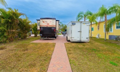 Prime Location RV Lot in Exclusive Clothing-Optional Community - on The Groves Golf and Country Club in Florida - for sale on GolfHomes.com, golf home, golf lot