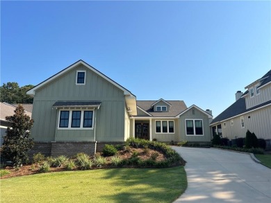 Welcome to this stunning one story cottage-style home nestled in on Lakewood Golf Club in Alabama - for sale on GolfHomes.com, golf home, golf lot