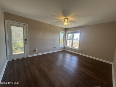 Enjoy the best of coastal living with water views of the Neuse on Harbour Point Golf Club in North Carolina - for sale on GolfHomes.com, golf home, golf lot