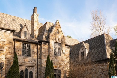 Designed by Atlanta architect Durham Crout, this French Normandy on Shoal Creek Golf Course in Alabama - for sale on GolfHomes.com, golf home, golf lot