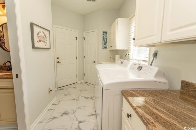 Experience Tidewater Serenity -- Where Resort Living Meets on Tidewater Golf Club and Plantation in South Carolina - for sale on GolfHomes.com, golf home, golf lot