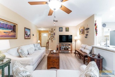 Inviting lakefront home with golf course views, set along a on South Padre Island Golf Club in Texas - for sale on GolfHomes.com, golf home, golf lot