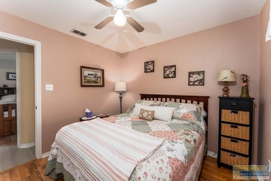 Inviting lakefront home with golf course views, set along a on South Padre Island Golf Club in Texas - for sale on GolfHomes.com, golf home, golf lot