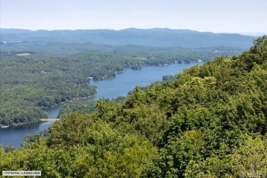 Captivating long-range views of the Blue Ridge Mountains await! on Lake Toxaway Country Club in North Carolina - for sale on GolfHomes.com, golf home, golf lot