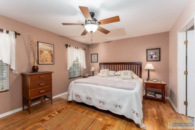 Inviting lakefront home with golf course views, set along a on South Padre Island Golf Club in Texas - for sale on GolfHomes.com, golf home, golf lot