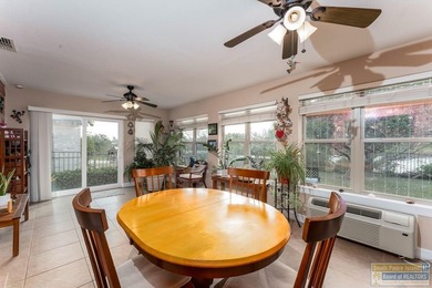 Inviting lakefront home with golf course views, set along a on South Padre Island Golf Club in Texas - for sale on GolfHomes.com, golf home, golf lot