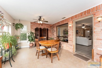 Inviting lakefront home with golf course views, set along a on South Padre Island Golf Club in Texas - for sale on GolfHomes.com, golf home, golf lot