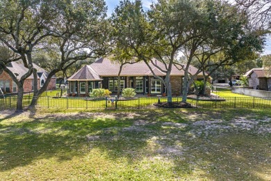 Located in the beautiful Rockport Country Club, this gracious on Rockport Country Club in Texas - for sale on GolfHomes.com, golf home, golf lot