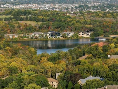 Stunning remodeled home in the prestigious Loch Llyod gated on Loch Lloyd Country Club in Missouri - for sale on GolfHomes.com, golf home, golf lot