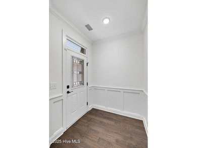 This beautifully maintained residence is set within the popular on Magnolia Greens Golf Plantation in North Carolina - for sale on GolfHomes.com, golf home, golf lot