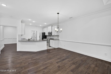 This beautifully maintained residence is set within the popular on Magnolia Greens Golf Plantation in North Carolina - for sale on GolfHomes.com, golf home, golf lot