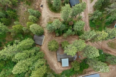 Peaceful Mountain Home. Wooded and well maintained with Vaulted on Terrace Lakes Golf Resort in Idaho - for sale on GolfHomes.com, golf home, golf lot