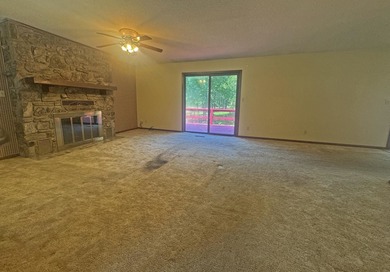 Nestled along the coveted North Golf Course in Cherokee Village on Cherokee Village North Course in Arkansas - for sale on GolfHomes.com, golf home, golf lot