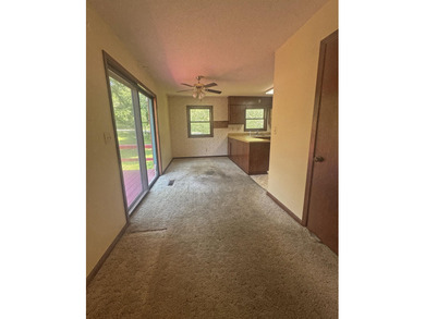 Nestled along the coveted North Golf Course in Cherokee Village on Cherokee Village North Course in Arkansas - for sale on GolfHomes.com, golf home, golf lot