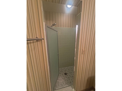 Nestled along the coveted North Golf Course in Cherokee Village on Cherokee Village North Course in Arkansas - for sale on GolfHomes.com, golf home, golf lot