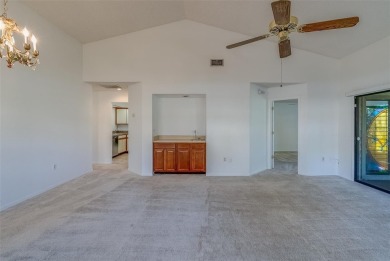 Enjoy the privacy and comfort of a large, split floorplan villa on Highland Lakes Executive Golf Course in Florida - for sale on GolfHomes.com, golf home, golf lot