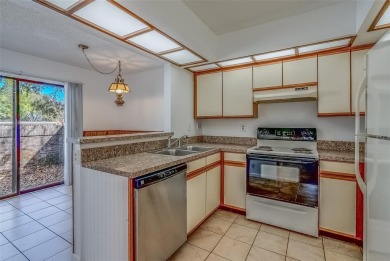 Enjoy the privacy and comfort of a large, split floorplan villa on Highland Lakes Executive Golf Course in Florida - for sale on GolfHomes.com, golf home, golf lot