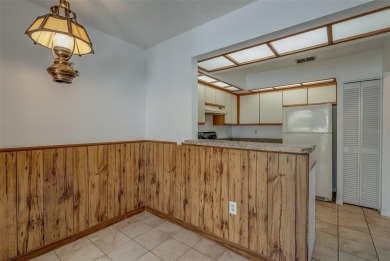 Enjoy the privacy and comfort of a large, split floorplan villa on Highland Lakes Executive Golf Course in Florida - for sale on GolfHomes.com, golf home, golf lot