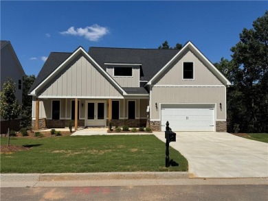 Welcome to the Littleson Plan at Carter Grove - where timeless on The Plantation Golf Club in Georgia - for sale on GolfHomes.com, golf home, golf lot