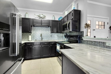 Price Improvement!! Spectacular Waterfront Town Home with Deeded on The Club At Hidden Creek in Florida - for sale on GolfHomes.com, golf home, golf lot