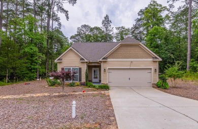 This elegant 3-bedroom, 2.5-bath, single-level home offers the on Monticello Golf Club At Savannah Lakes in South Carolina - for sale on GolfHomes.com, golf home, golf lot