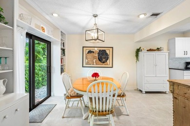 Discover the ultimate blend of elegance and effortless living in on Quail Ridge Golf Course and Country Club in Florida - for sale on GolfHomes.com, golf home, golf lot