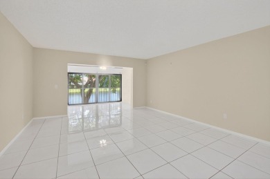 Stunning 2-Bed, 2-Bath Condo in a Gated Community with on Boca Lago Golf and Country Club in Florida - for sale on GolfHomes.com, golf home, golf lot